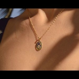 Hand made 14k Gold Hamsa with premium diamonds.